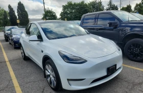 Tesla Model Y AWD* Long range* Parking control* Памет* Подгрев - 23400 € / 45766.42 лв. - 18354172 2