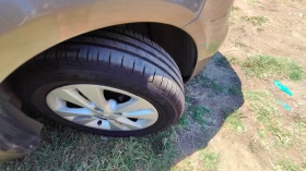 Nissan Note 1.4i газов инжекцион, снимка 11