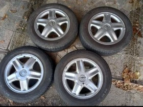        195/60R15  Opel Astra