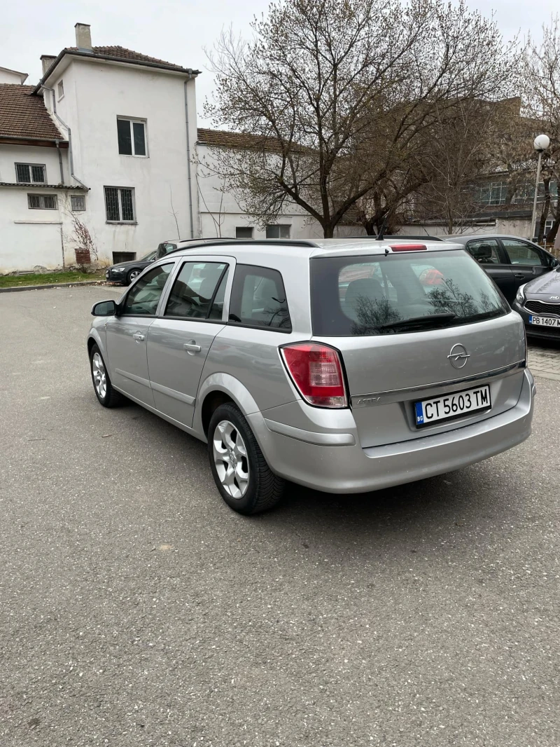 Opel Astra, снимка 14 - Автомобили и джипове - 51463076