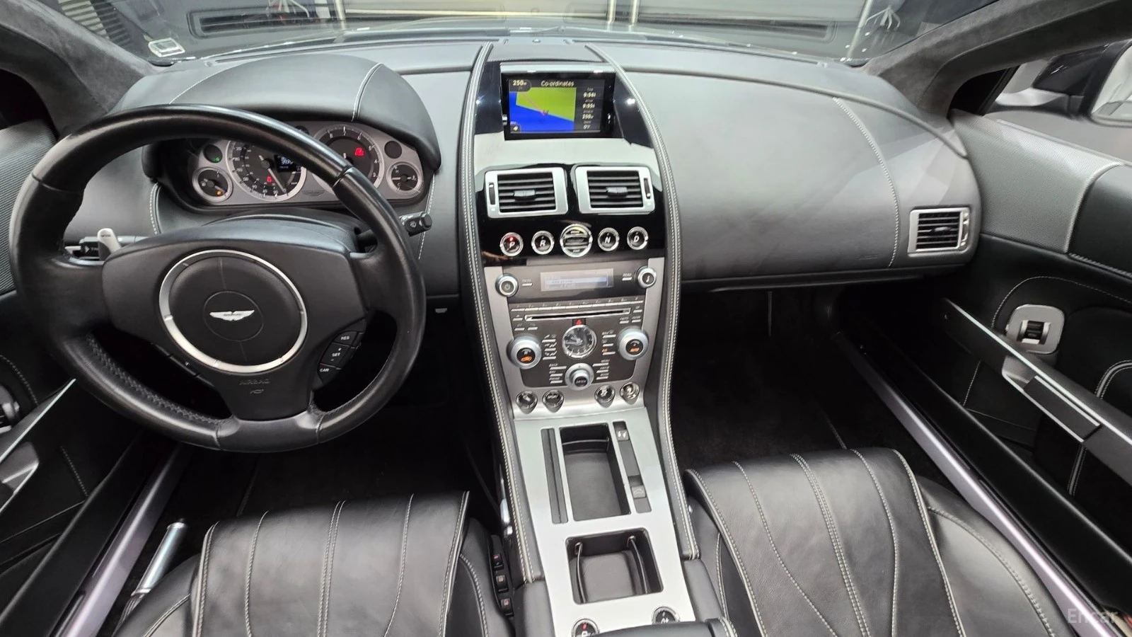 Aston Martin Db9 6.0 V12 Volante* КОЖА* НАВИ* КАМЕРА, снимка 6 - Автомобили и джипове - 55466320
