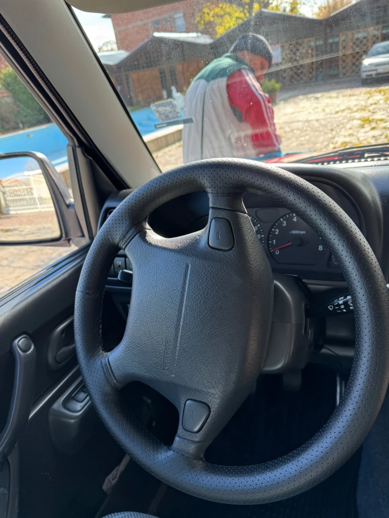 Suzuki Jimny 1.3 DOCH16V, снимка 13 - Автомобили и джипове - 48119707