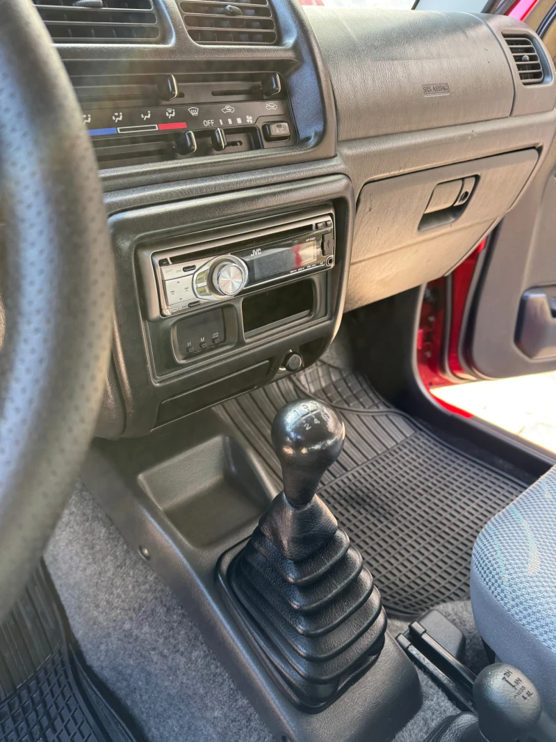 Suzuki Jimny 1.3 DOCH16V, снимка 15 - Автомобили и джипове - 48119707