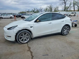 ������ Tesla Model Y