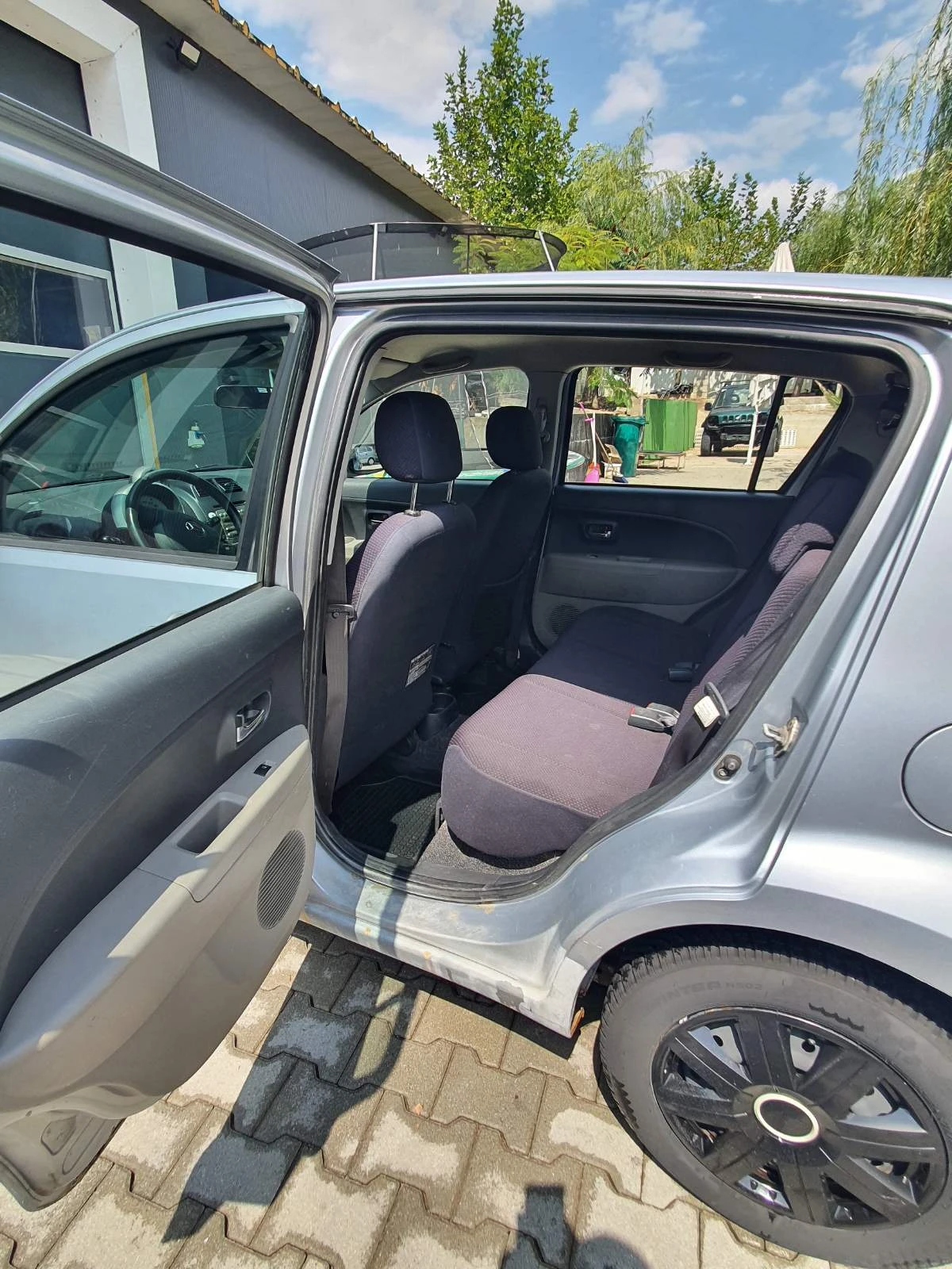 Daihatsu Sirion 1.3, снимка 9 - Автомобили и джипове - 55803102