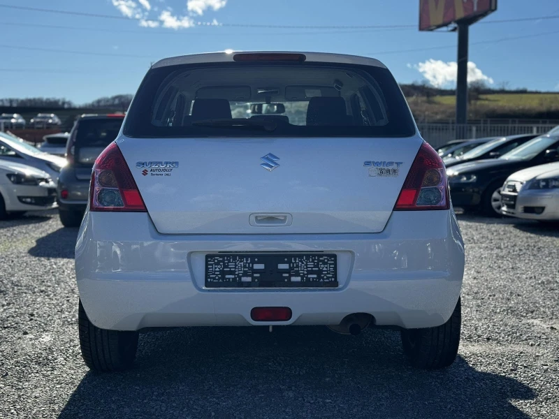 Suzuki Swift 1.3I, снимка 8 - Автомобили и джипове - 52553572