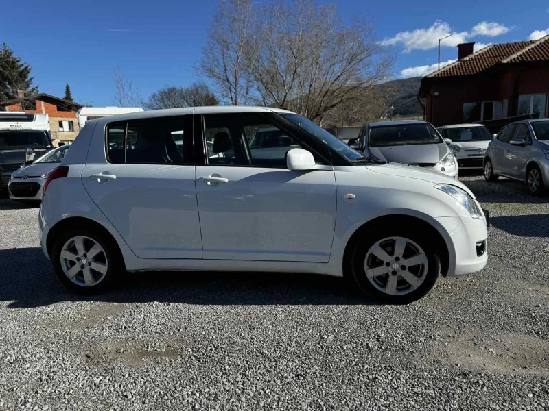 Suzuki Swift 1.3I, снимка 7 - Автомобили и джипове - 52553572