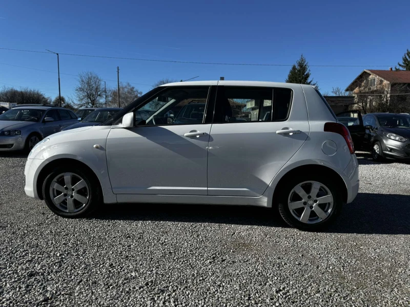 Suzuki Swift 1.3I, снимка 6 - Автомобили и джипове - 52553572