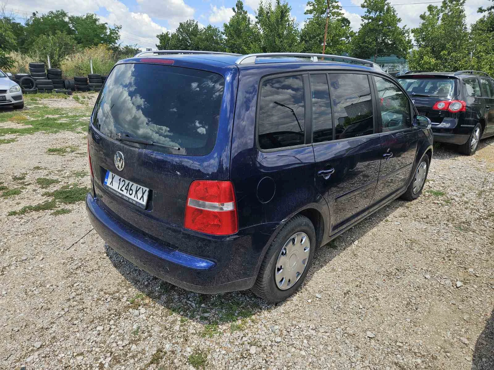 VW Touran 2.0TDI 136к.с - изображение 4