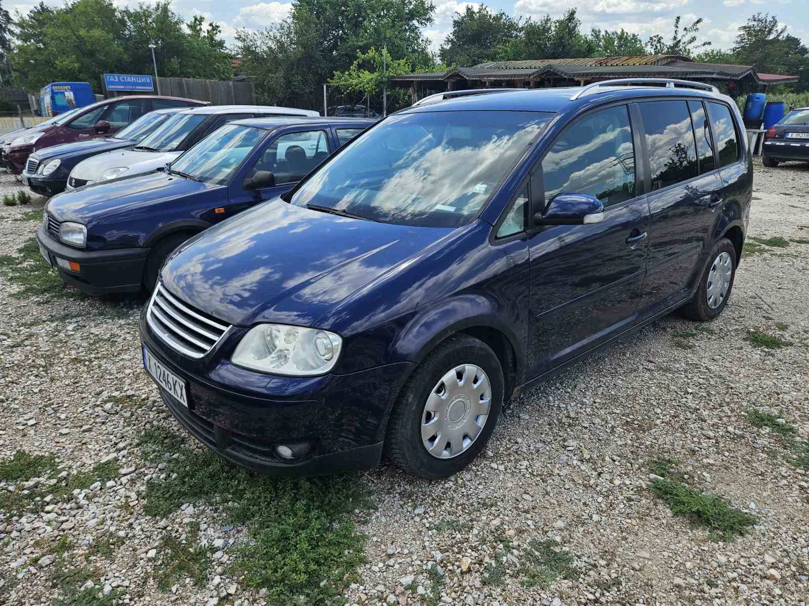 VW Touran 2.0TDI 136к.с - изображение 2