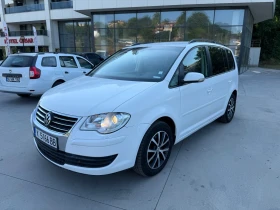     VW Touran /  //