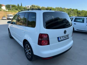     VW Touran /  //