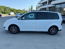     VW Touran /  //