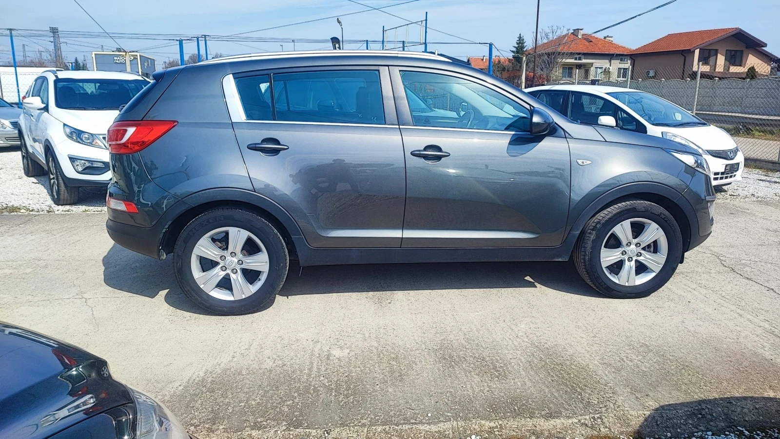 Kia Sportage 1.6i, снимка 4 - Автомобили и джипове - 53982524