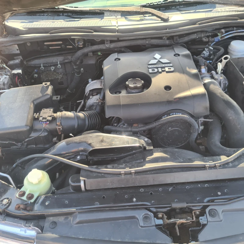 Mitsubishi L200, снимка 12 - Автомобили и джипове - 51586644