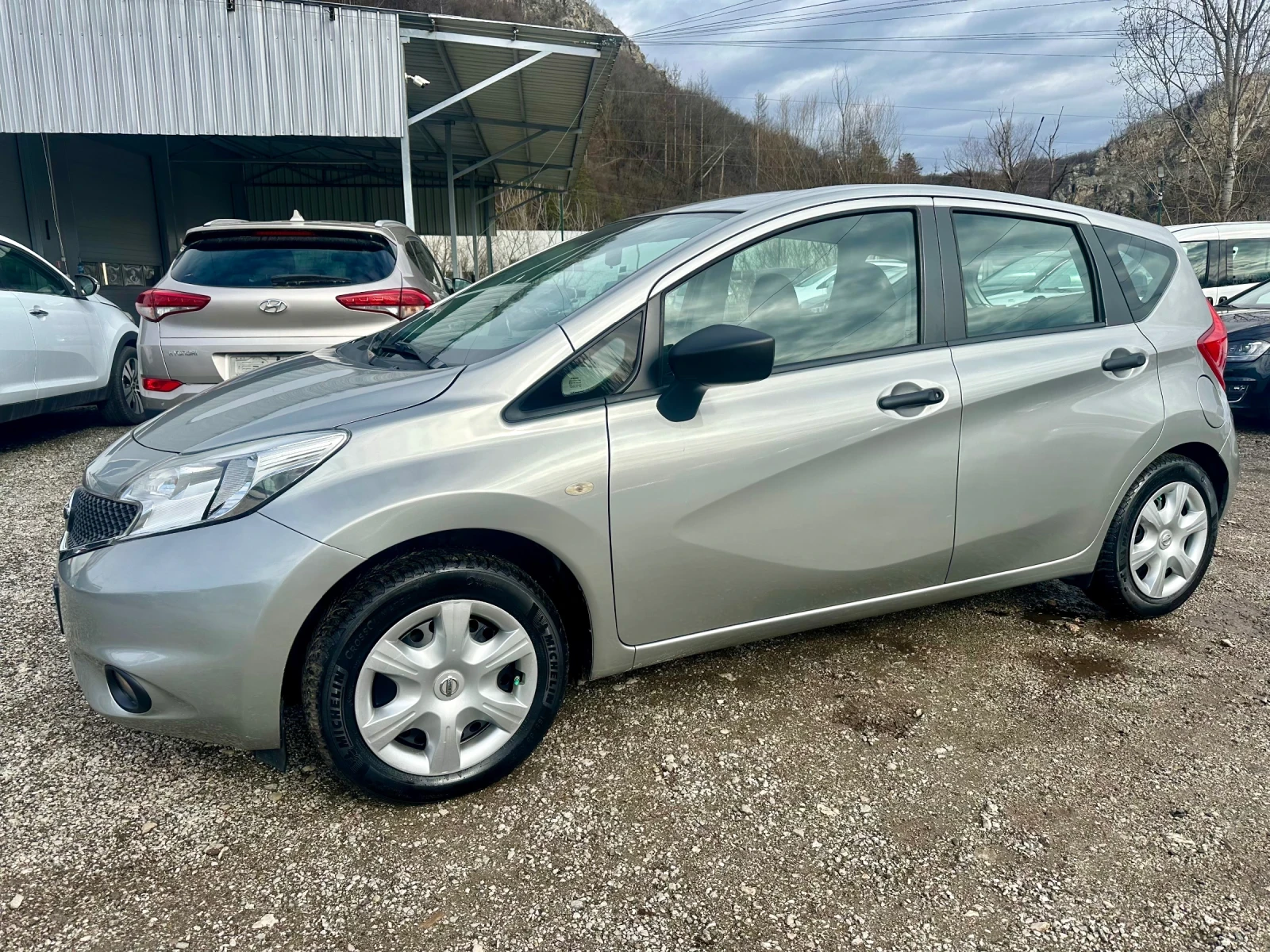 Nissan Note 1.2i-ACENTA-80к.с - изображение 2