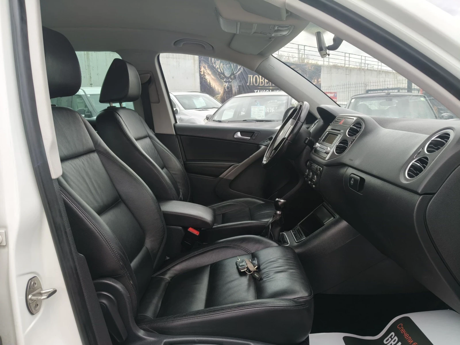 VW Tiguan 2.0TDI, снимка 14 - Автомобили и джипове - 56434751
