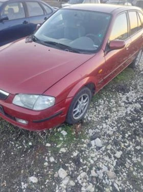 Mazda 323 2.0  - [3] 