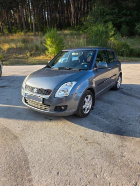 Suzuki Swift 1.3i 4x4, снимка 1