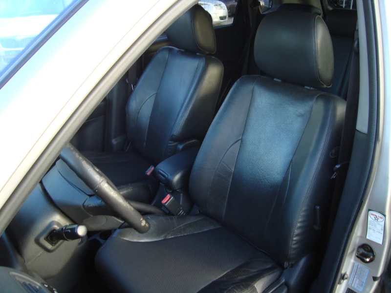 Hyundai Tucson 2.0i, снимка 6 - Автомобили и джипове - 47631987