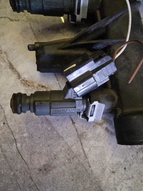 0280157127 инжекторна дюза PEUGEOT 208 1.0 1.2 VTI 