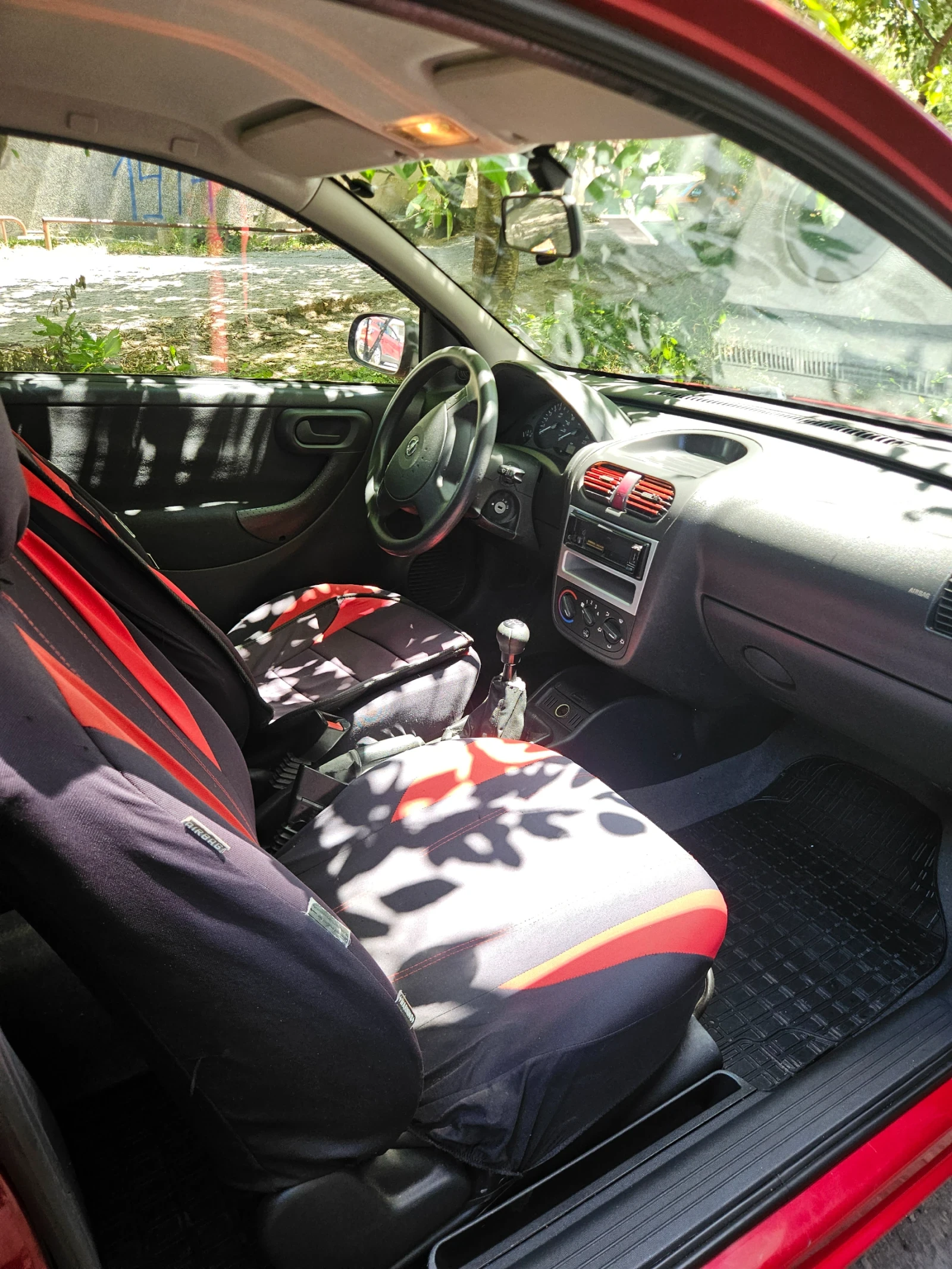 Opel Corsa, снимка 12 - Автомобили и джипове - 55359694