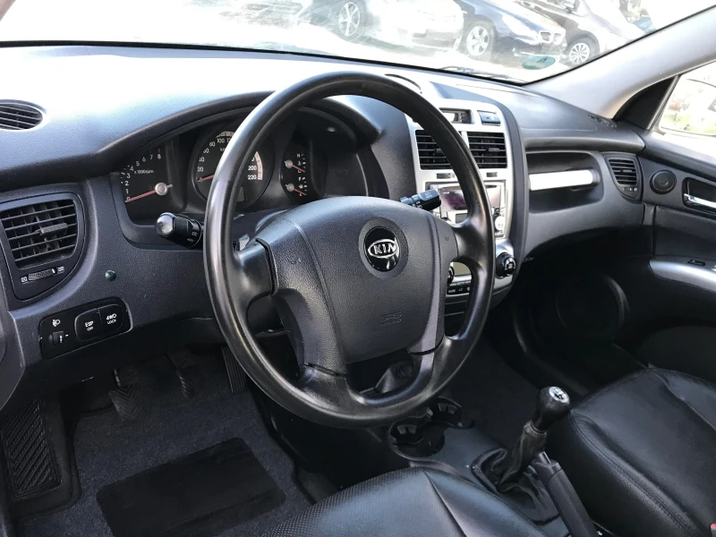 Kia Sportage 2.0i-4x4-Бензин , снимка 13 - Автомобили и джипове - 47989089