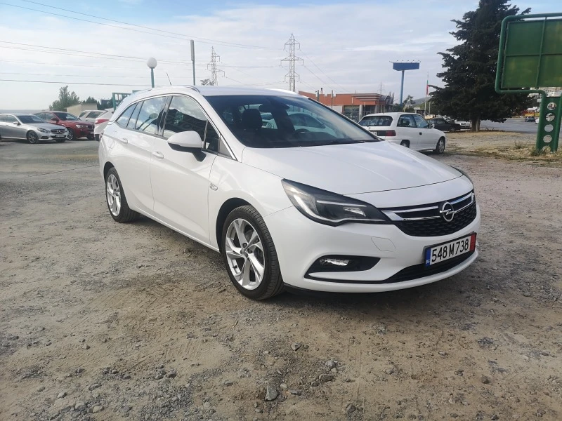 Opel Astra sport tourer, снимка 7 - Автомобили и джипове - 42511960