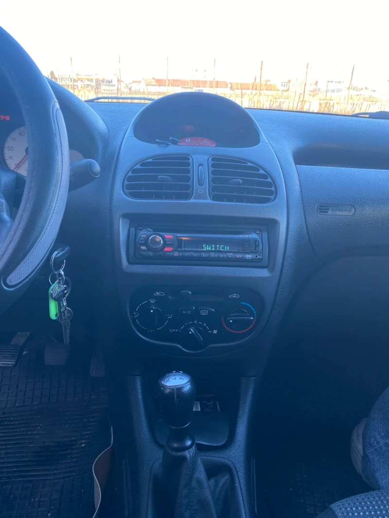 Peugeot 206 1.4HDI, снимка 11 - Автомобили и джипове - 48401121