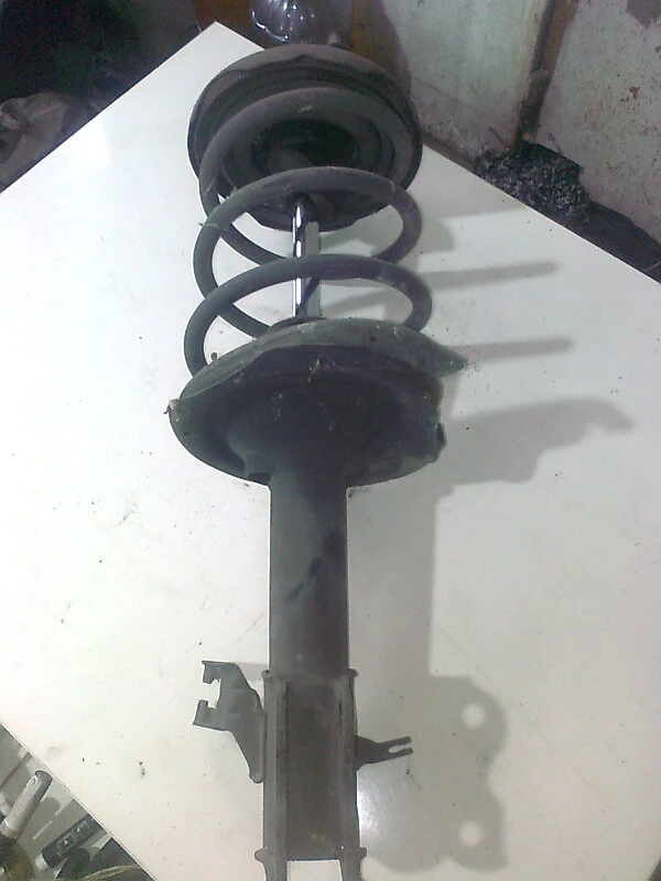 макферсон преден десен за Нисан Алмера Тино 2.2di