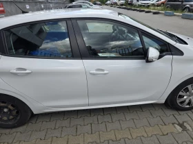 Peugeot 208, снимка 10