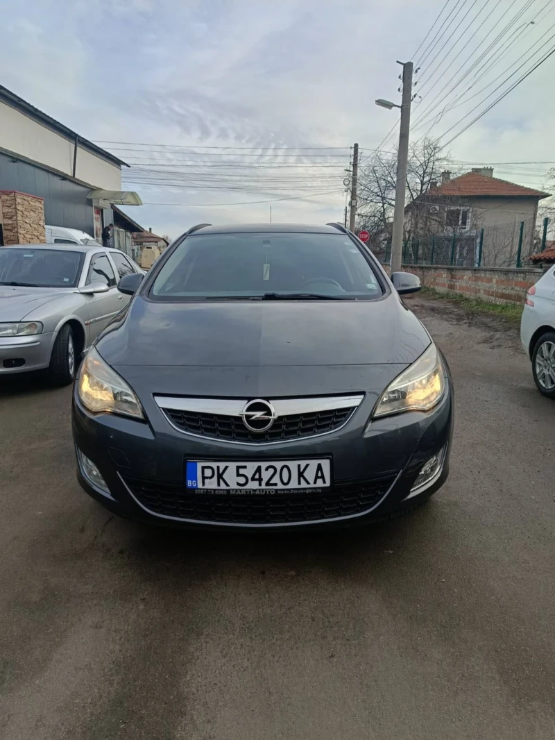 Opel Astra Sports Tourer , снимка 1 - Автомобили и джипове - 48839850