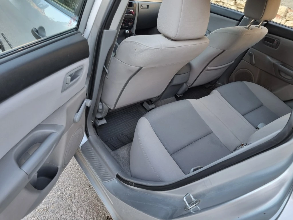 Mazda 3 1.4, снимка 7 - Автомобили и джипове - 53783178