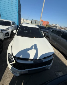 ������ Kia Sportage