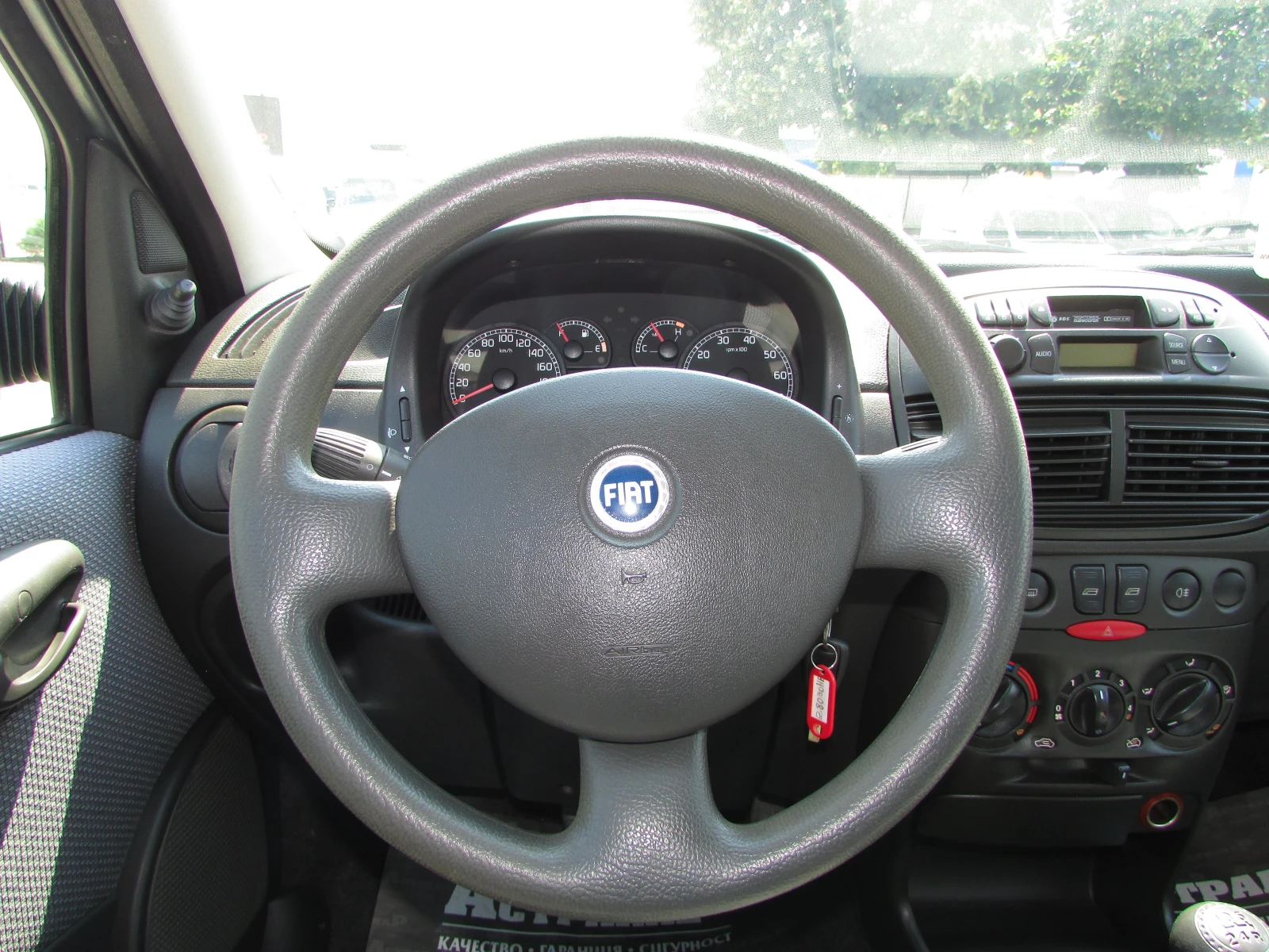 Fiat Punto 1.2i EURO4, снимка 11 - Автомобили и джипове - 55596086