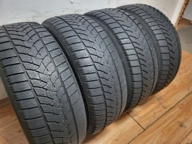 Гуми Зимни 235/65R17, снимка 5 - Гуми и джанти - 48202911