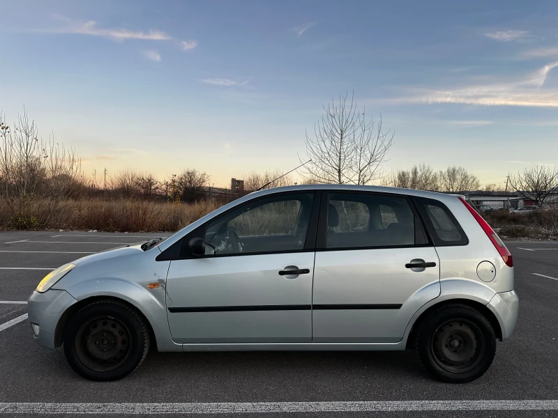 Ford Fiesta 1.4 HDI 68 кс 4 врати, снимка 7 - Автомобили и джипове - 48407831