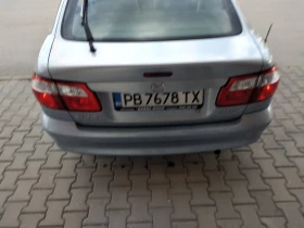 Mazda 626 1.8 Газ Бензин, снимка 6