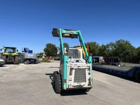 Мини челни товарачи GEHL Mustang 2044, снимка 4