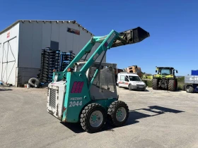 Мини челни товарачи GEHL Mustang 2044, снимка 3