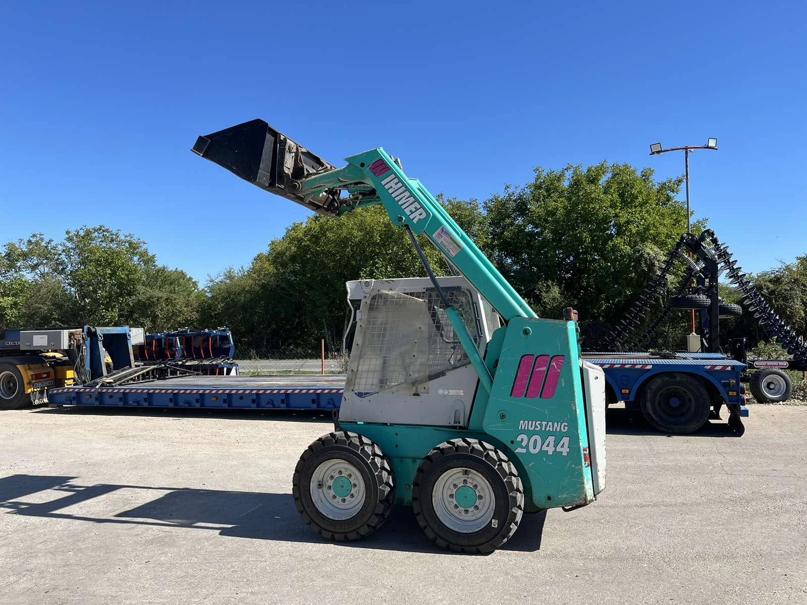 Мини челни товарачи GEHL Mustang 2044, снимка 1