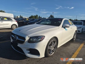 ������ Mercedes-Benz E 400