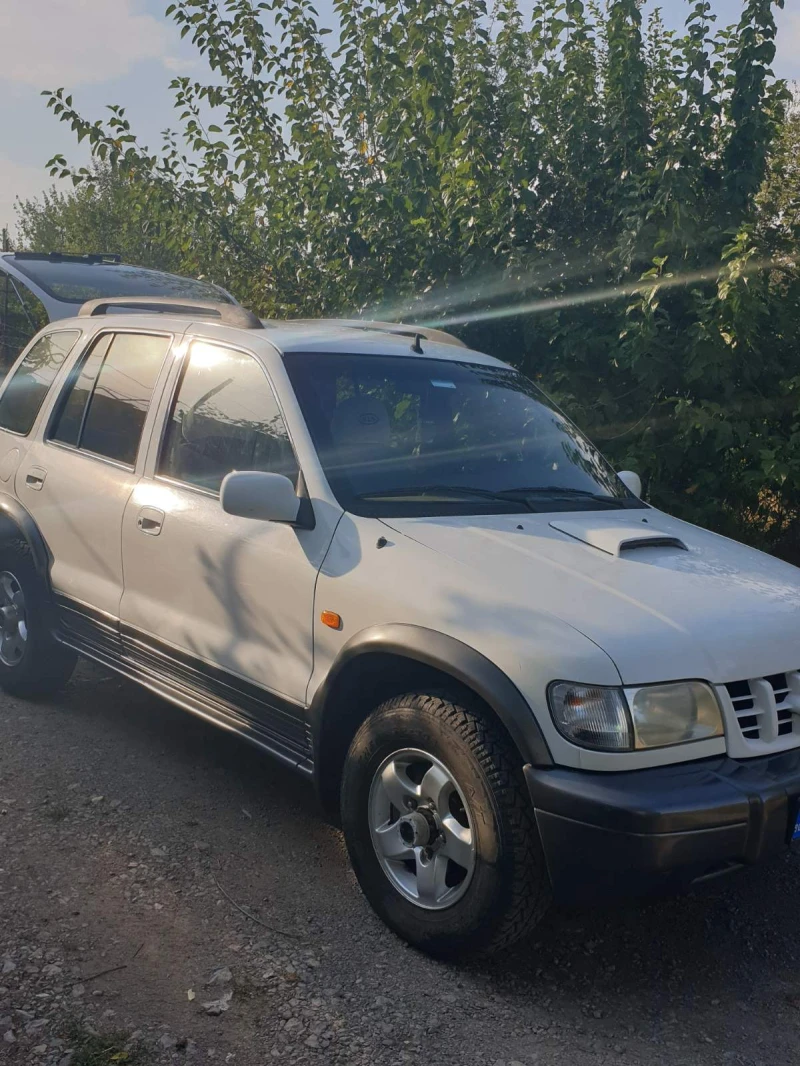 Kia Sportage 2.0, снимка 7 - Автомобили и джипове - 46969234