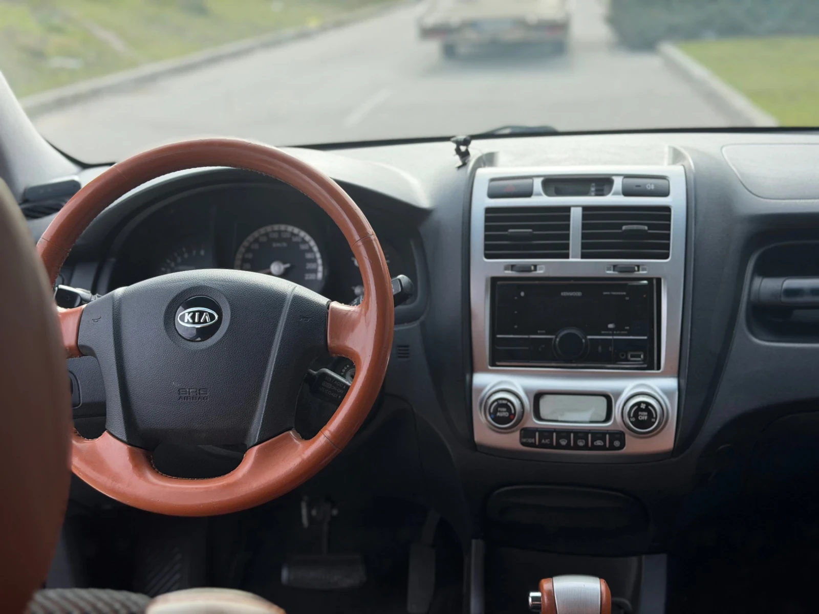 Kia Sportage 2.7/4WD/АВТОМАТ/ТОП, снимка 16 - Автомобили и джипове - 53744245