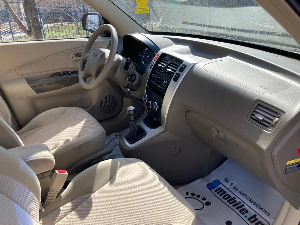 Hyundai Tucson 2, 0i 4x4 ГАЗОВ ИНЖЕКЦИОН | Mobile.bg — изображение 11
