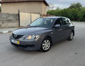 Mazda 3 1.4i* 153000км* 2 комплекта гуми* Климатик