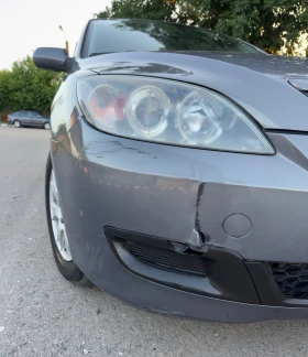 Mazda 3 1.4i* 153000км* 2 комплекта гуми* Климатик - 1499 € / 2931.79 лв. - 19714645 12