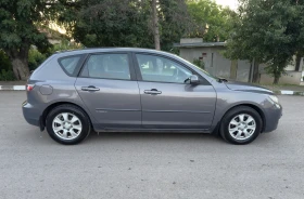 Mazda 3 1.4i* 153000км* 2 комплекта гуми* Климатик - 1499 € / 2931.79 лв. - 19714645 4