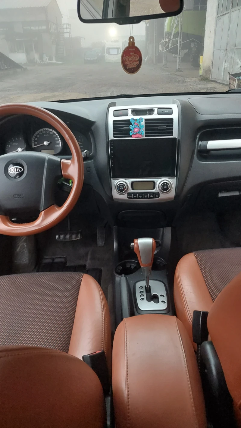 Kia Sportage 2.0 CRDI -АВТОМАТИК, снимка 4 - Автомобили и джипове - 52878259