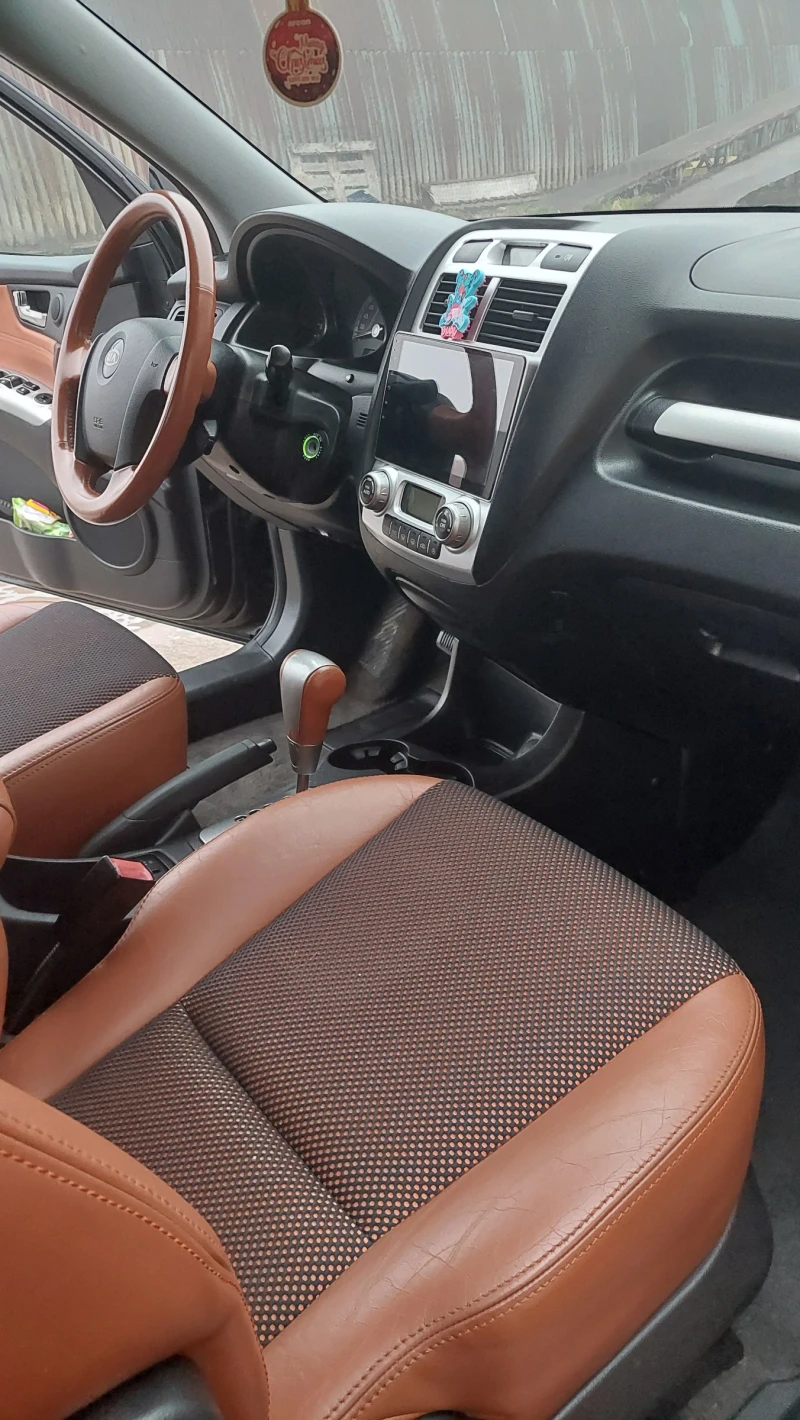 Kia Sportage 2.0 CRDI -АВТОМАТИК, снимка 10 - Автомобили и джипове - 52878259